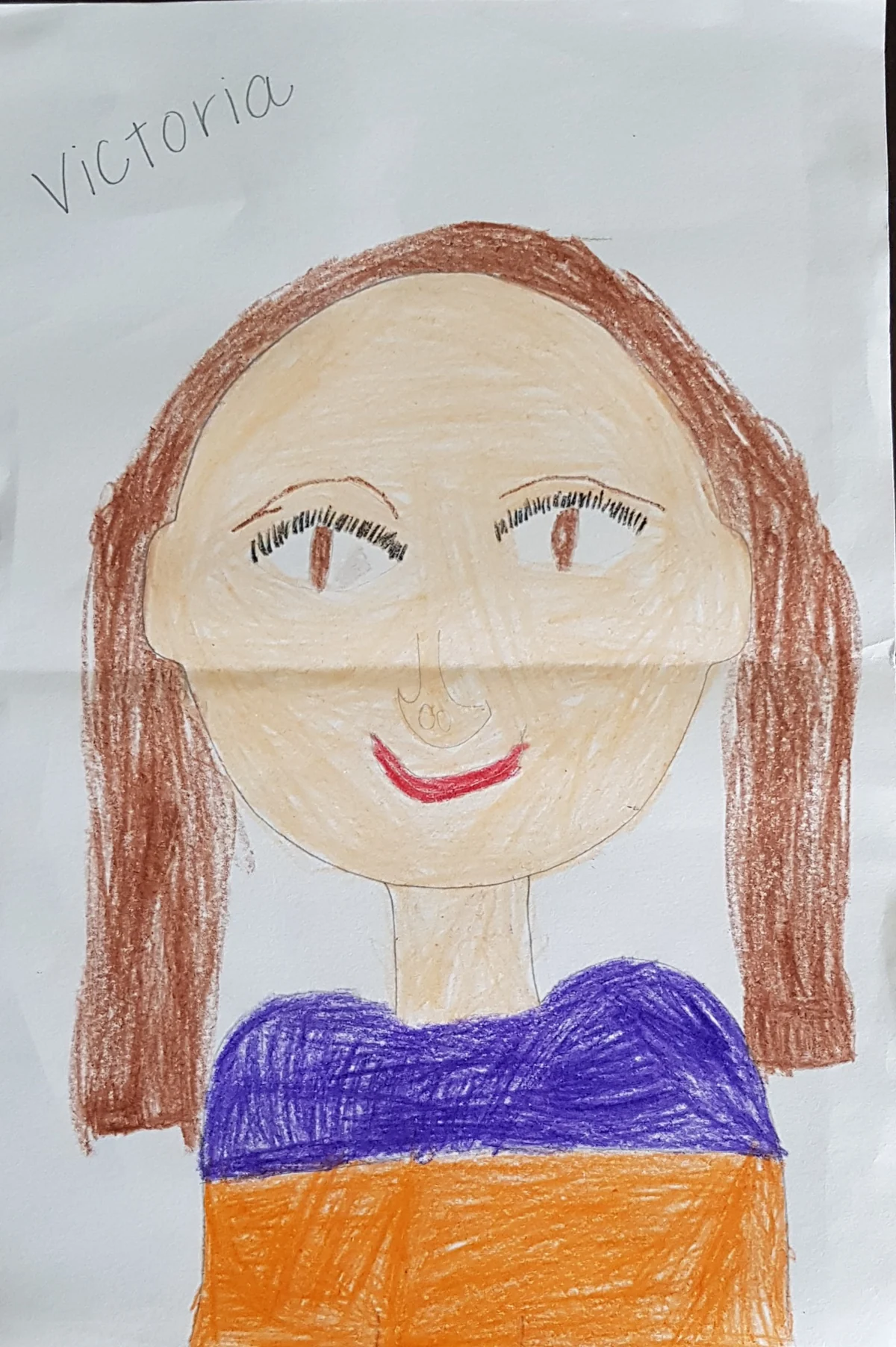 Self-portrait drawing by Victoria, age 11